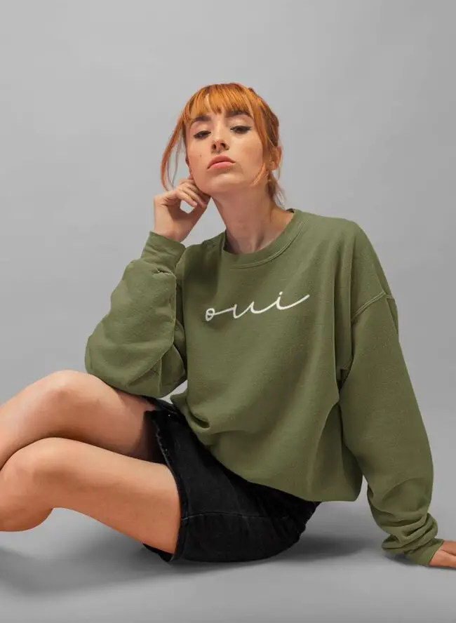 Olive "Oui" Sweatshirt with Black Denim Skirt